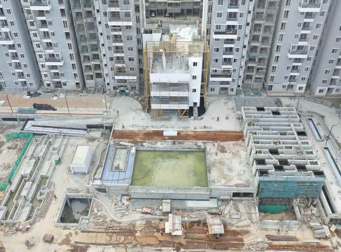 Podium and pool under construction at a high-rise site